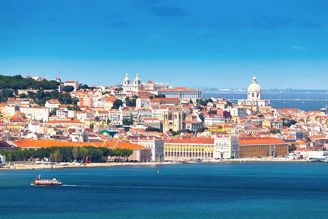 A stunning aerial view overlooking Lisbon's downtown district and the River Tagus.