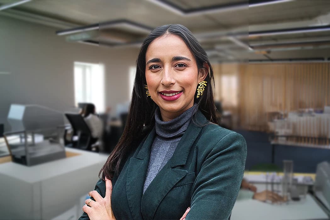 Smiling director in an office, guiding the buying process in Portugal